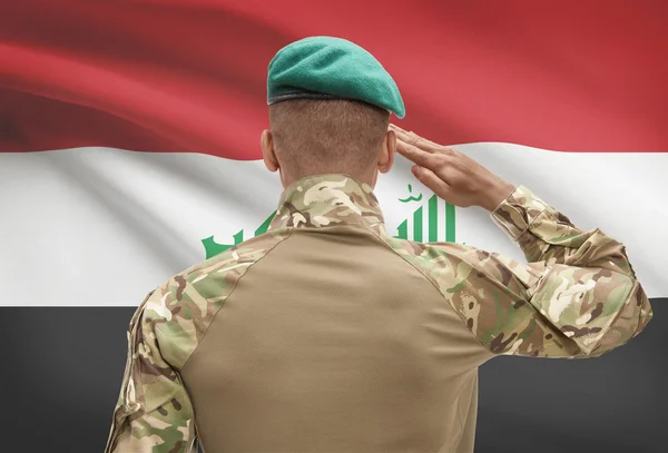 Soldato scura con la bandierina su priorità bassa - Iraq — Foto Stock