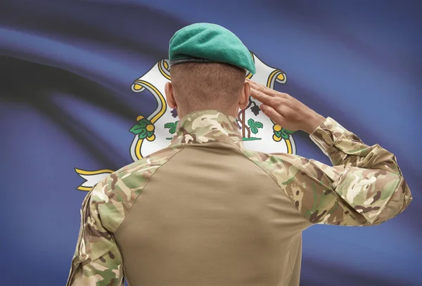 Dark-skinned soldier with US state flag on background - Connecticut — Stock Photo, Image