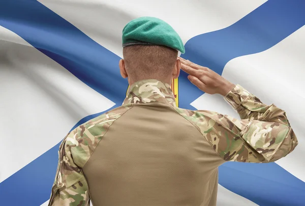 Donkerhuidige soldaat met Canadese provincie vlag op achtergrond - Nova Scotia — Stockfoto