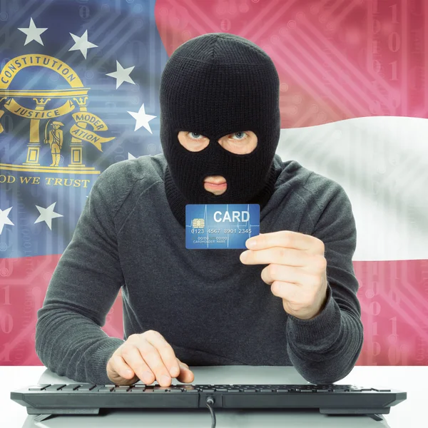 Hacker con tarjeta de crédito y bandera de estado de Estados Unidos - Georgia —  Fotos de Stock