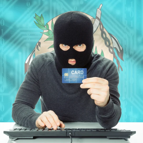 Hacker con tarjeta de crédito y bandera de estado de Estados Unidos - Oklahoma —  Fotos de Stock