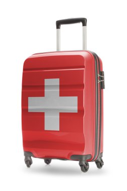 O - İsviçre Ulusal bayrağını bavulla