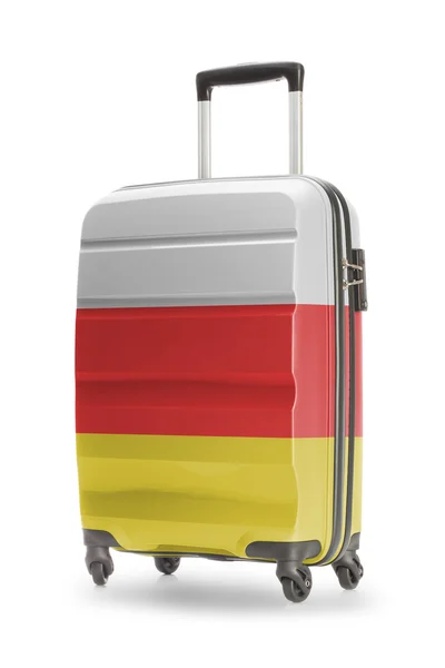 Bőröndöt rajta - Dél-Oszétia zászlaja — Stock Fotó