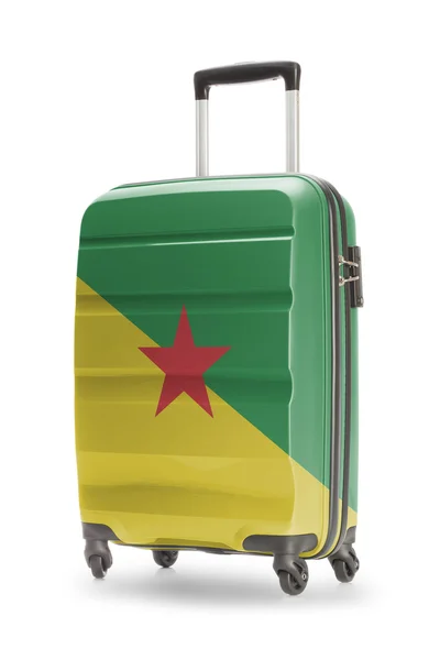 Koffer met nationale vlag op het - Frans Guyana — Stockfoto