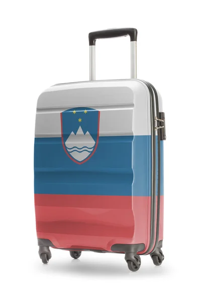 Koffer met nationale vlag op het - Slovenië — Stockfoto