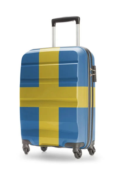 O - İsveç Ulusal bayrağını bavulla — Stok fotoğraf