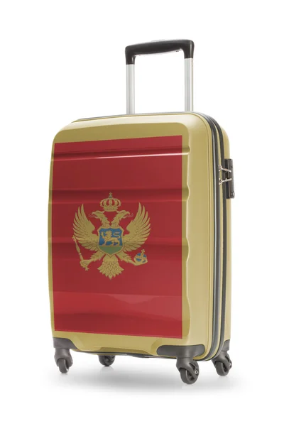 Βαλίτσα με εθνική σημαία σε αυτό - Μαυροβούνιο — Φωτογραφία Αρχείου