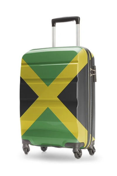 Resväska med nationella flagga på den - Jamaica — Stockfoto