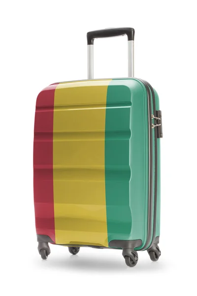 Koffer mit Nationalflagge drauf - Guinea — Stockfoto