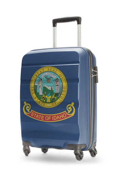 Suitcase with US state flag on it - Idaho — Stock Photo, Image