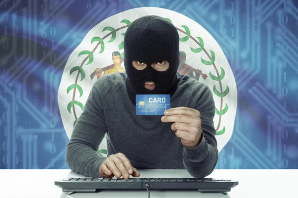 皮肤黑黑客与持有信用卡-伯利兹的背景上的标志 — 图库照片