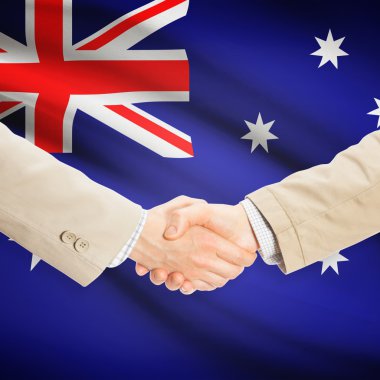 Arka plan - Avustralya bayrağı ile işadamları el sıkışma