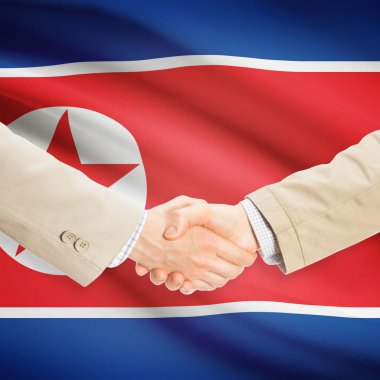 Arka plan - Kuzey Kore bayrağı ile işadamları el sıkışma
