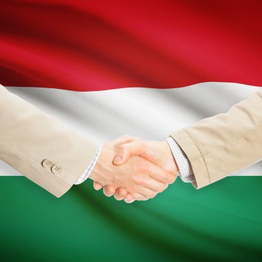 Arka plan - Macaristan bayrağı ile işadamları el sıkışma