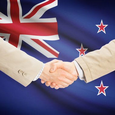 Arka plan - Yeni Zelanda bayrağı ile işadamları el sıkışma