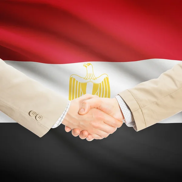 Businessmen handshake with flag on background - Egypt — Stock Photo, Image