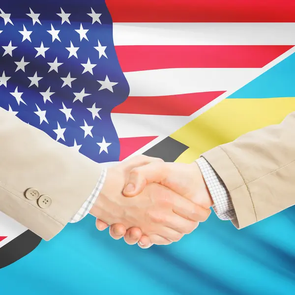 Podnikatelé handshake - USA a Bahamy — Stock fotografie