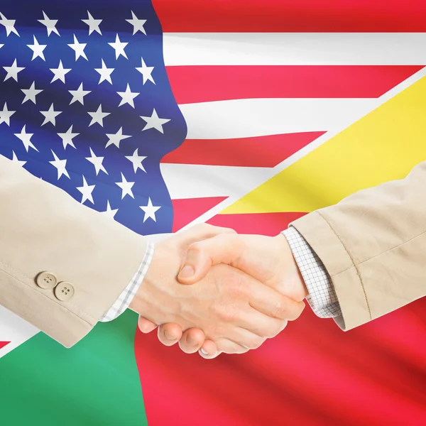 Unternehmer-Handshake - USA und Benin — Stockfoto