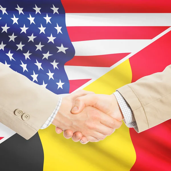 Businessmen handshake - United States and Belgium — Stock Photo, Image