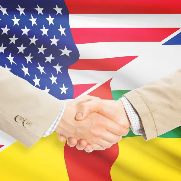 商人握手-美国和中部非洲阴谋诡计 — 图库照片