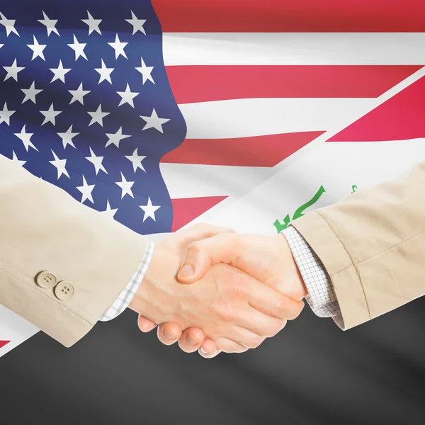 商人握手-美国和伊拉克 — 图库照片