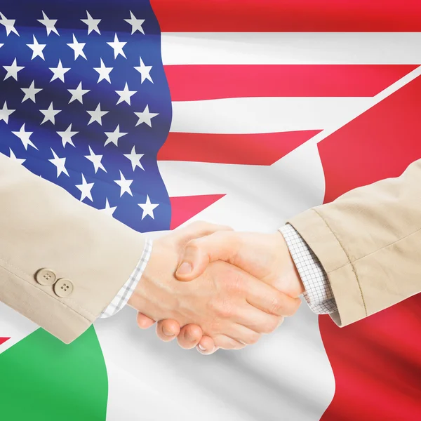 Unternehmer-Handshake - USA und Italien — Stockfoto