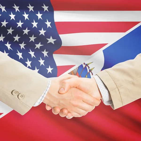 商人握手-美国和海地 — 图库照片
