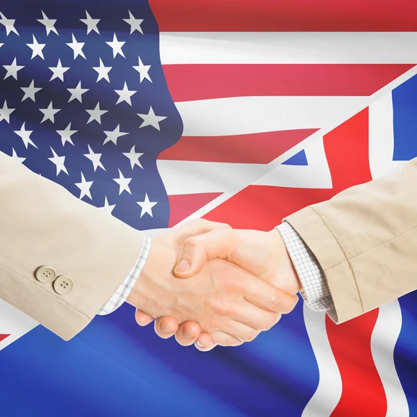 Businessmen handshake - United States and Iceland — Stock Photo, Image