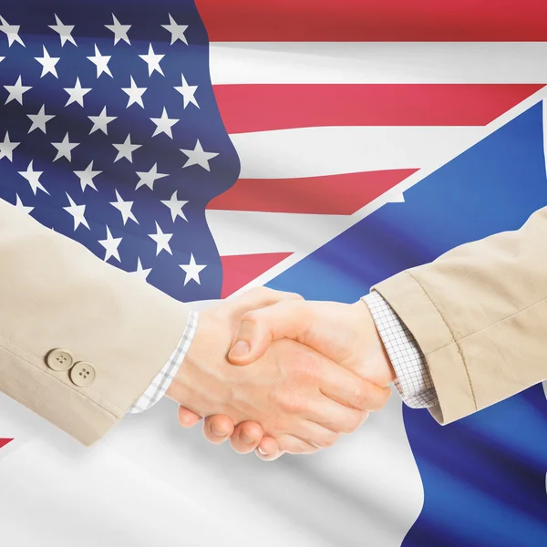 Businessmen handshake - United States and Finland — Stock Photo, Image