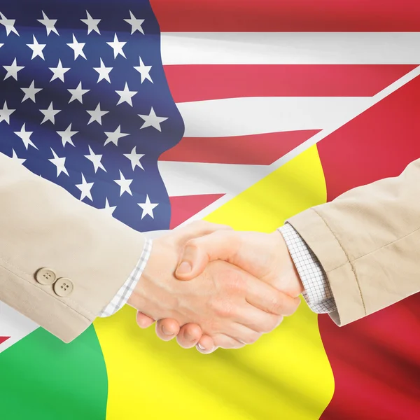 Podnikatelé handshake - USA a Mali — Stock fotografie