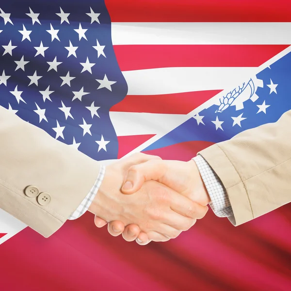 Unternehmer-Handshake - USA und Bhutan — Stockfoto