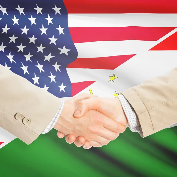 Unternehmer-Handshake - USA und Tadschikistan — Stockfoto