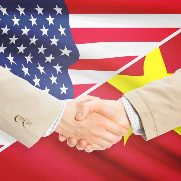 Apretón de manos de hombres de negocios - Estados Unidos y Vietnam — Foto de Stock