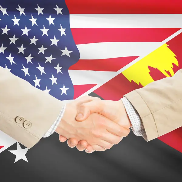 Stretta di mano degli uomini d'affari - Stati Uniti d'America e Papua Nuova Guinea — Foto Stock