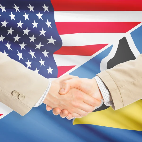 Podnikatelé handshake - USA a Svatá Lucie — Stock fotografie