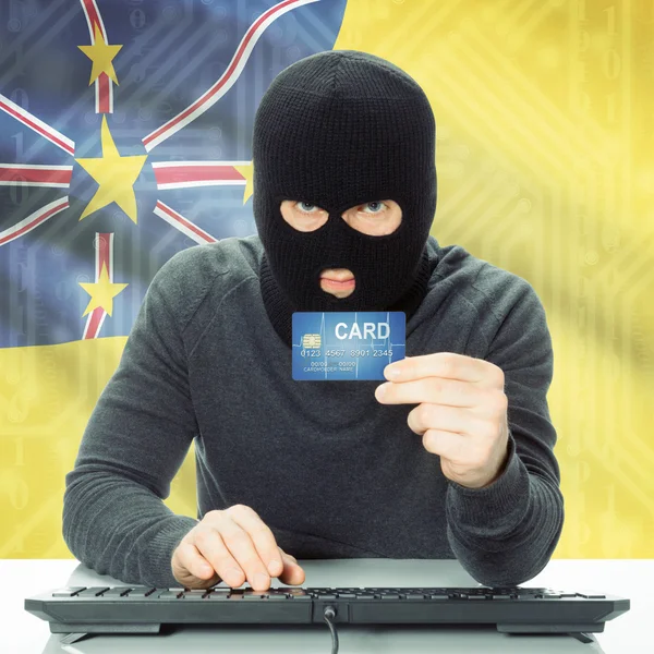 国旗上的背景-纽埃与网络犯罪概念的 — 图库照片