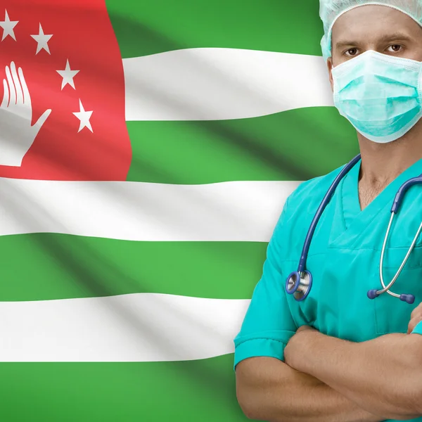 Surgeon with flag on background series - Abkhazia — Stock Photo, Image