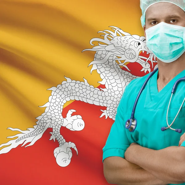 Chirurg s vlajkou na pozadí řady - Bhútán — Stock fotografie