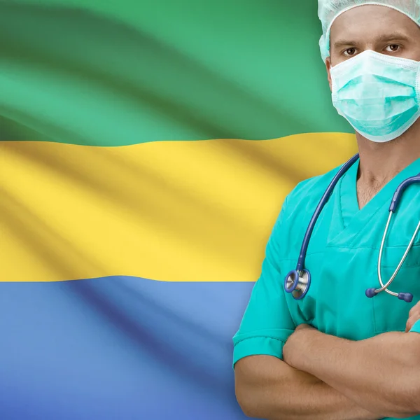 Surgeon with flag on background series - Gabon — Stock Photo, Image