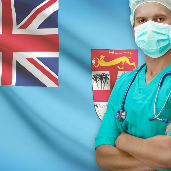 Chirurg s vlajkou na pozadí řady - Fidži — Stock fotografie
