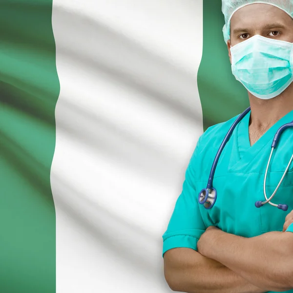 Chirurgo con la bandierina sulla serie della priorità bassa - Nigeria — Foto Stock