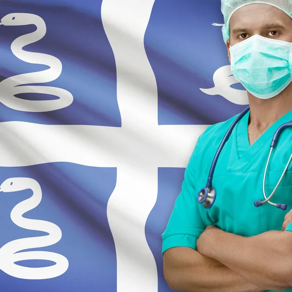 Хирург с флагом на фоне серии - Мартиника — стоковое фото