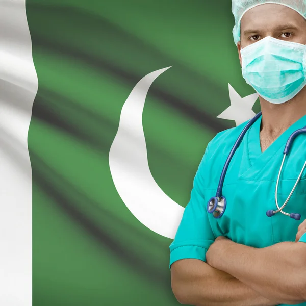 Chirurgo con la bandierina sulla serie della priorità bassa - Pakistan — Foto Stock