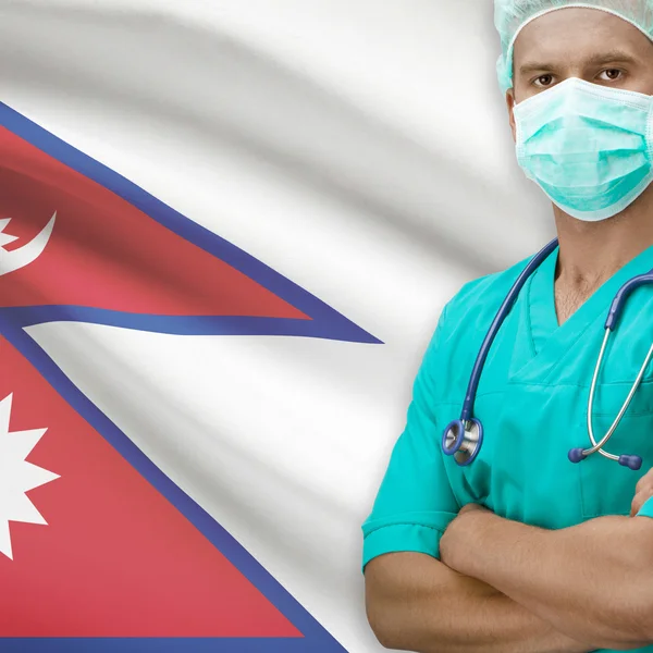 Cirurgião com bandeira na série de fundo - Nepal — Fotografia de Stock