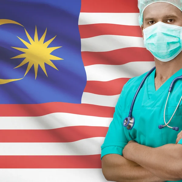 Surgeon with flag on background series - Malaysia — Stock Photo, Image