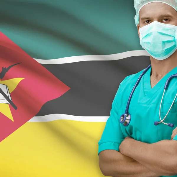 Surgeon with flag on background series - Mozambique — Stock Photo, Image