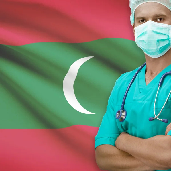 Surgeon with flag on background series - Maldives — Stock Photo, Image