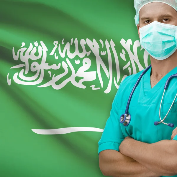 Хирург с флагом на фоне серии - Саудовская Аравия — стоковое фото