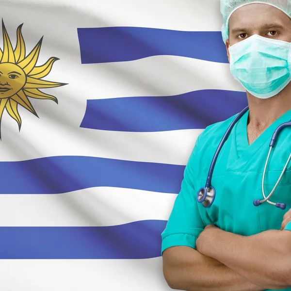 Surgeon with flag on background series - Uruguay — Stock Photo, Image