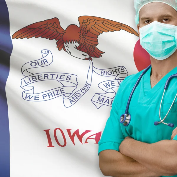 Surgeon with US states flags on background series - Iowa — Stock Photo, Image